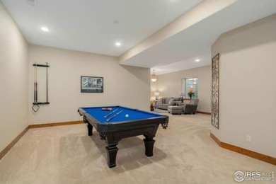 This custom ranch home on a stunning waterfront lot offers an on Pelican Lakes Golf and Country Club in Colorado - for sale on GolfHomes.com, golf home, golf lot