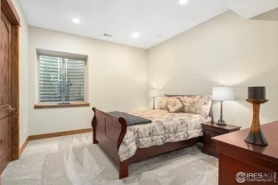 This custom ranch home on a stunning waterfront lot offers an on Pelican Lakes Golf and Country Club in Colorado - for sale on GolfHomes.com, golf home, golf lot