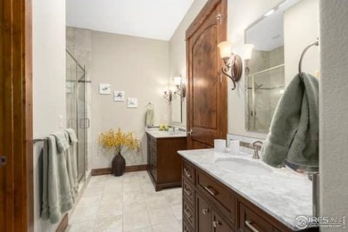 This custom ranch home on a stunning waterfront lot offers an on Pelican Lakes Golf and Country Club in Colorado - for sale on GolfHomes.com, golf home, golf lot