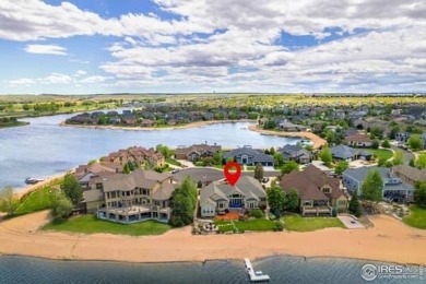 This custom ranch home on a stunning waterfront lot offers an on Pelican Lakes Golf and Country Club in Colorado - for sale on GolfHomes.com, golf home, golf lot