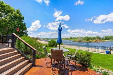 This custom ranch home on a stunning waterfront lot offers an on Pelican Lakes Golf and Country Club in Colorado - for sale on GolfHomes.com, golf home, golf lot