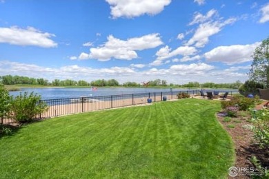 This custom ranch home on a stunning waterfront lot offers an on Pelican Lakes Golf and Country Club in Colorado - for sale on GolfHomes.com, golf home, golf lot
