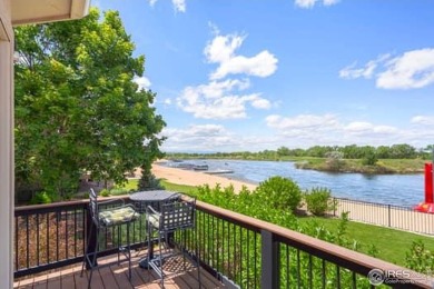 This custom ranch home on a stunning waterfront lot offers an on Pelican Lakes Golf and Country Club in Colorado - for sale on GolfHomes.com, golf home, golf lot