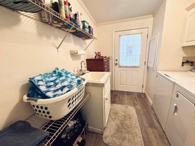 Immaculate Triple-Wide Beauty! Spacious 3 Bed / 2 Bath in on Schalamar Creek Golf and Country Club in Florida - for sale on GolfHomes.com, golf home, golf lot