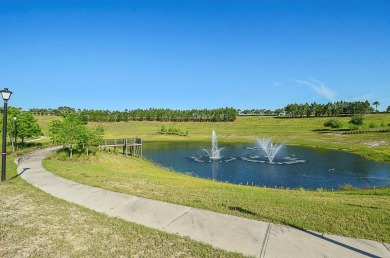 Under contract-accepting backup offers. This beautifully on Kings Ridge Golf Club in Florida - for sale on GolfHomes.com, golf home, golf lot