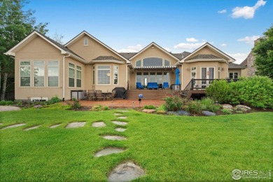 This custom ranch home on a stunning waterfront lot offers an on Pelican Lakes Golf and Country Club in Colorado - for sale on GolfHomes.com, golf home, golf lot