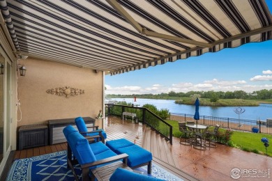 This custom ranch home on a stunning waterfront lot offers an on Pelican Lakes Golf and Country Club in Colorado - for sale on GolfHomes.com, golf home, golf lot