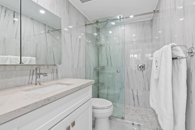 This stunningly remodeled residence boasts a luxurious ambiance on Coral Ridge Country Club in Florida - for sale on GolfHomes.com, golf home, golf lot