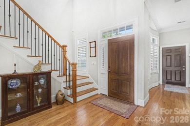 Handsome townhome tucked behind the 15th green of Raintree's on Raintree Country Club in North Carolina - for sale on GolfHomes.com, golf home, golf lot