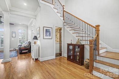 Handsome townhome tucked behind the 15th green of Raintree's on Raintree Country Club in North Carolina - for sale on GolfHomes.com, golf home, golf lot