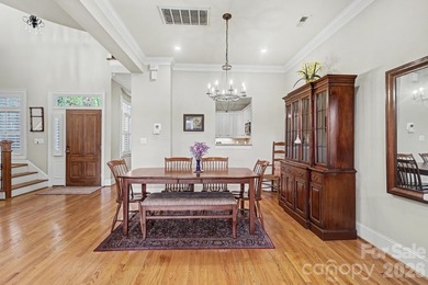 Handsome townhome tucked behind the 15th green of Raintree's on Raintree Country Club in North Carolina - for sale on GolfHomes.com, golf home, golf lot