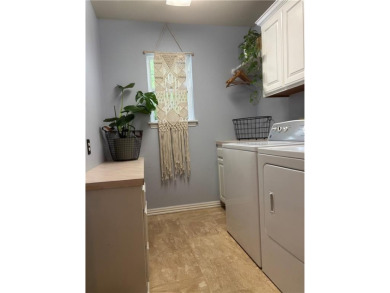 This beautifully updated and maintained 3-bedroom, 2  1/2  -bath on Holiday Island Executive Golf Course in Arkansas - for sale on GolfHomes.com, golf home, golf lot