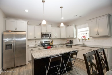 Built in 2023 and located inside the gated Woodlake community on Woodlake Country Club in North Carolina - for sale on GolfHomes.com, golf home, golf lot