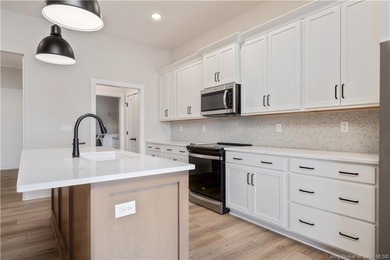 WELCOME TO CHAMPIONS POINTE & this stunning, LIKE-NEW home on Champions Pointe Golf Course in Indiana - for sale on GolfHomes.com, golf home, golf lot