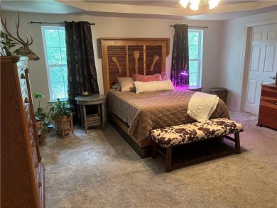 This beautifully updated and maintained 3-bedroom, 2  1/2  -bath on Holiday Island Executive Golf Course in Arkansas - for sale on GolfHomes.com, golf home, golf lot