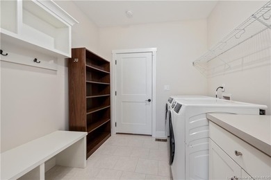 WELCOME TO CHAMPIONS POINTE & this stunning, LIKE-NEW home on Champions Pointe Golf Course in Indiana - for sale on GolfHomes.com, golf home, golf lot