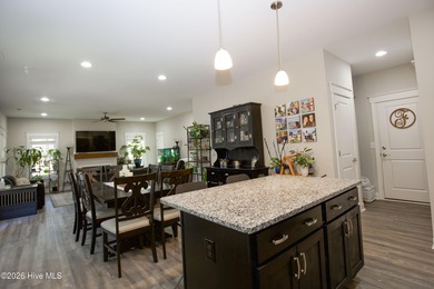 Built in 2023 and located inside the gated Woodlake community on Woodlake Country Club in North Carolina - for sale on GolfHomes.com, golf home, golf lot