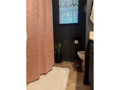 This beautifully updated and maintained 3-bedroom, 2  1/2  -bath on Holiday Island Executive Golf Course in Arkansas - for sale on GolfHomes.com, golf home, golf lot