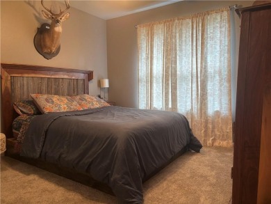 This beautifully updated and maintained 3-bedroom, 2  1/2  -bath on Holiday Island Executive Golf Course in Arkansas - for sale on GolfHomes.com, golf home, golf lot