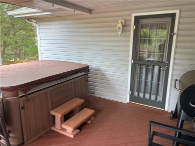 This beautifully updated and maintained 3-bedroom, 2  1/2  -bath on Holiday Island Executive Golf Course in Arkansas - for sale on GolfHomes.com, golf home, golf lot