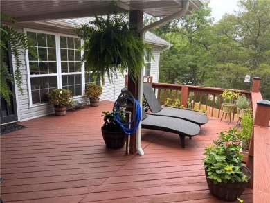 This beautifully updated and maintained 3-bedroom, 2  1/2  -bath on Holiday Island Executive Golf Course in Arkansas - for sale on GolfHomes.com, golf home, golf lot