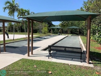 MOTIVATED SELLER! This 3/2 end unit is well maintained and on Palm-Aire Country Club and Resort - The Oaks in Florida - for sale on GolfHomes.com, golf home, golf lot