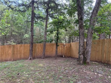 This beautifully updated and maintained 3-bedroom, 2  1/2  -bath on Holiday Island Executive Golf Course in Arkansas - for sale on GolfHomes.com, golf home, golf lot