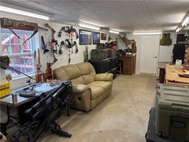 This beautifully updated and maintained 3-bedroom, 2  1/2  -bath on Holiday Island Executive Golf Course in Arkansas - for sale on GolfHomes.com, golf home, golf lot