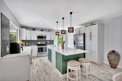 Make this your home! Beautifully renovated throughout with 2 on Eastpointe Country Club in Florida - for sale on GolfHomes.com, golf home, golf lot