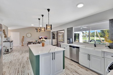 Make this your home! Beautifully renovated throughout with 2 on Eastpointe Country Club in Florida - for sale on GolfHomes.com, golf home, golf lot