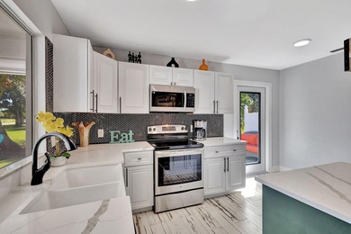 Make this your home! Beautifully renovated throughout with 2 on Eastpointe Country Club in Florida - for sale on GolfHomes.com, golf home, golf lot