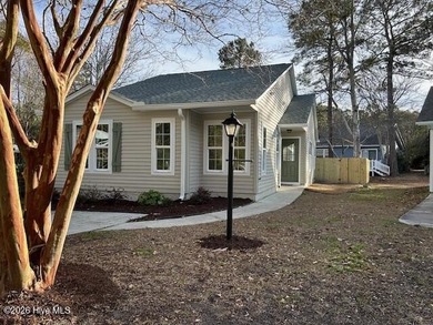 Charming cottage with 11 foot ceilings, bright and airy with a on Pearl Golf Links in North Carolina - for sale on GolfHomes.com, golf home, golf lot