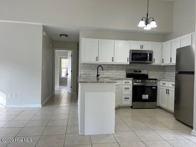 Charming cottage with 11 foot ceilings, bright and airy with a on Pearl Golf Links in North Carolina - for sale on GolfHomes.com, golf home, golf lot