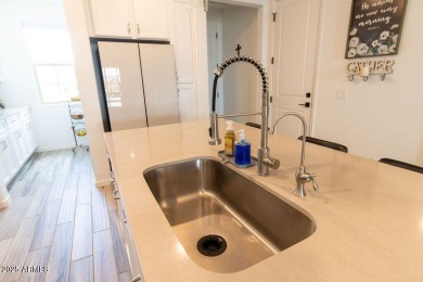 Welcome to your modern oasis in Victory at Verrado, where active on Verrado Golf Club - Victory in Arizona - for sale on GolfHomes.com, golf home, golf lot