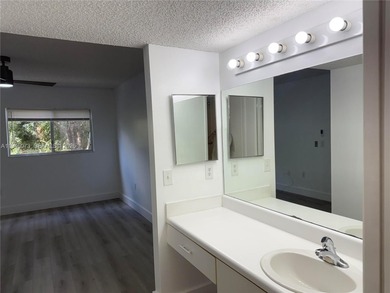 Bright & spacious updated condo 2 bedroom & 1.5 bath located in on Flamingo Lakes Country Club in Florida - for sale on GolfHomes.com, golf home, golf lot