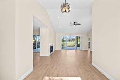 Reimagined and move-in ready, this waterfront home on an on The Legacy Golf and Tennis Club in Florida - for sale on GolfHomes.com, golf home, golf lot