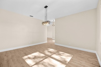 Reimagined and move-in ready, this waterfront home on an on The Legacy Golf and Tennis Club in Florida - for sale on GolfHomes.com, golf home, golf lot