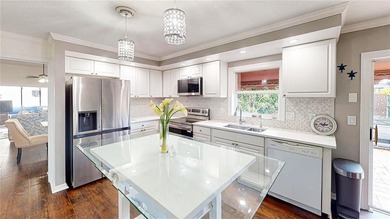 One or more photo(s) has been virtually staged. Beautifully on Peridia Golf and Country Club in Florida - for sale on GolfHomes.com, golf home, golf lot