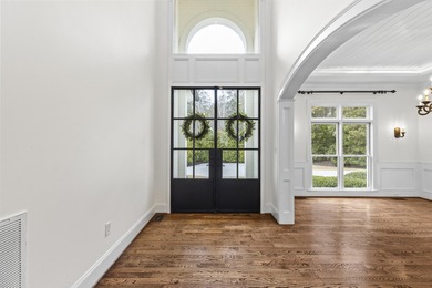 Welcome to an extraordinary luxury estate offering unmatched on Champions Retreat Golf Club in Georgia - for sale on GolfHomes.com, golf home, golf lot