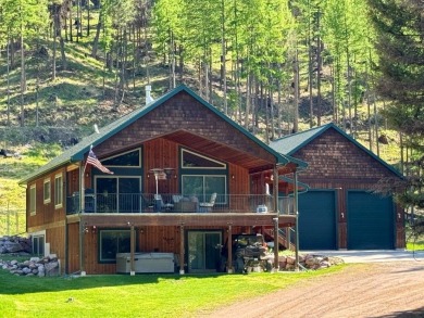Exceptional custom-built home on over 6 acres, bordered by tens on Double Arrow Lodge in Montana - for sale on GolfHomes.com, golf home, golf lot