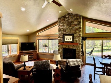Exceptional custom-built home on over 6 acres, bordered by tens on Double Arrow Lodge in Montana - for sale on GolfHomes.com, golf home, golf lot