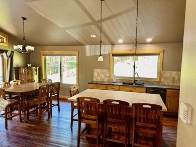 Exceptional custom-built home on over 6 acres, bordered by tens on Double Arrow Lodge in Montana - for sale on GolfHomes.com, golf home, golf lot
