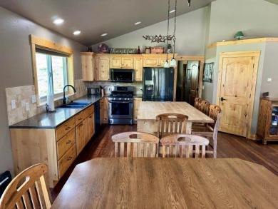 Exceptional custom-built home on over 6 acres, bordered by tens on Double Arrow Lodge in Montana - for sale on GolfHomes.com, golf home, golf lot