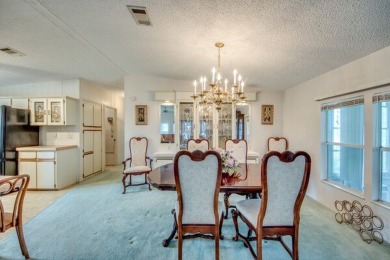 This furnished home is waiting for you to make it yours!   This on Pine Lakes Country Club in Florida - for sale on GolfHomes.com, golf home, golf lot