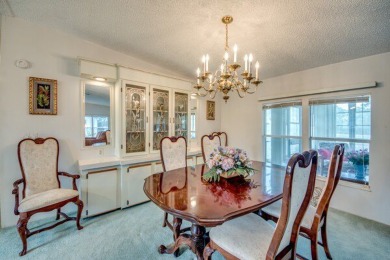 This furnished home is waiting for you to make it yours!   This on Pine Lakes Country Club in Florida - for sale on GolfHomes.com, golf home, golf lot