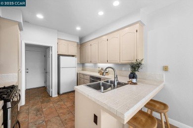 A charming two-story townhouse in Clayton's sought-after on Oakhurst Country Club in California - for sale on GolfHomes.com, golf home, golf lot