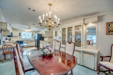 This furnished home is waiting for you to make it yours!   This on Pine Lakes Country Club in Florida - for sale on GolfHomes.com, golf home, golf lot