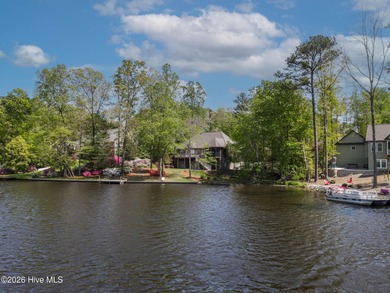 Priced to Sell! Stunning Waterfront Home on Rare Double Lot in on River Golf and Country Club at Lake Royale in North Carolina - for sale on GolfHomes.com, golf home, golf lot
