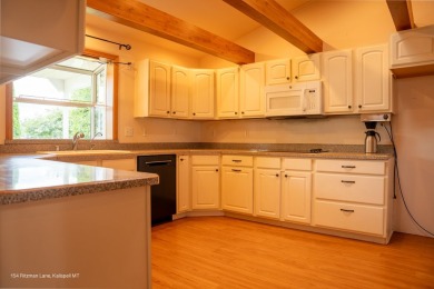 Welcome to this lovely ranch style home located in the center of on Village Greens Golf Club in Montana - for sale on GolfHomes.com, golf home, golf lot