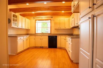 Welcome to this lovely ranch style home located in the center of on Village Greens Golf Club in Montana - for sale on GolfHomes.com, golf home, golf lot